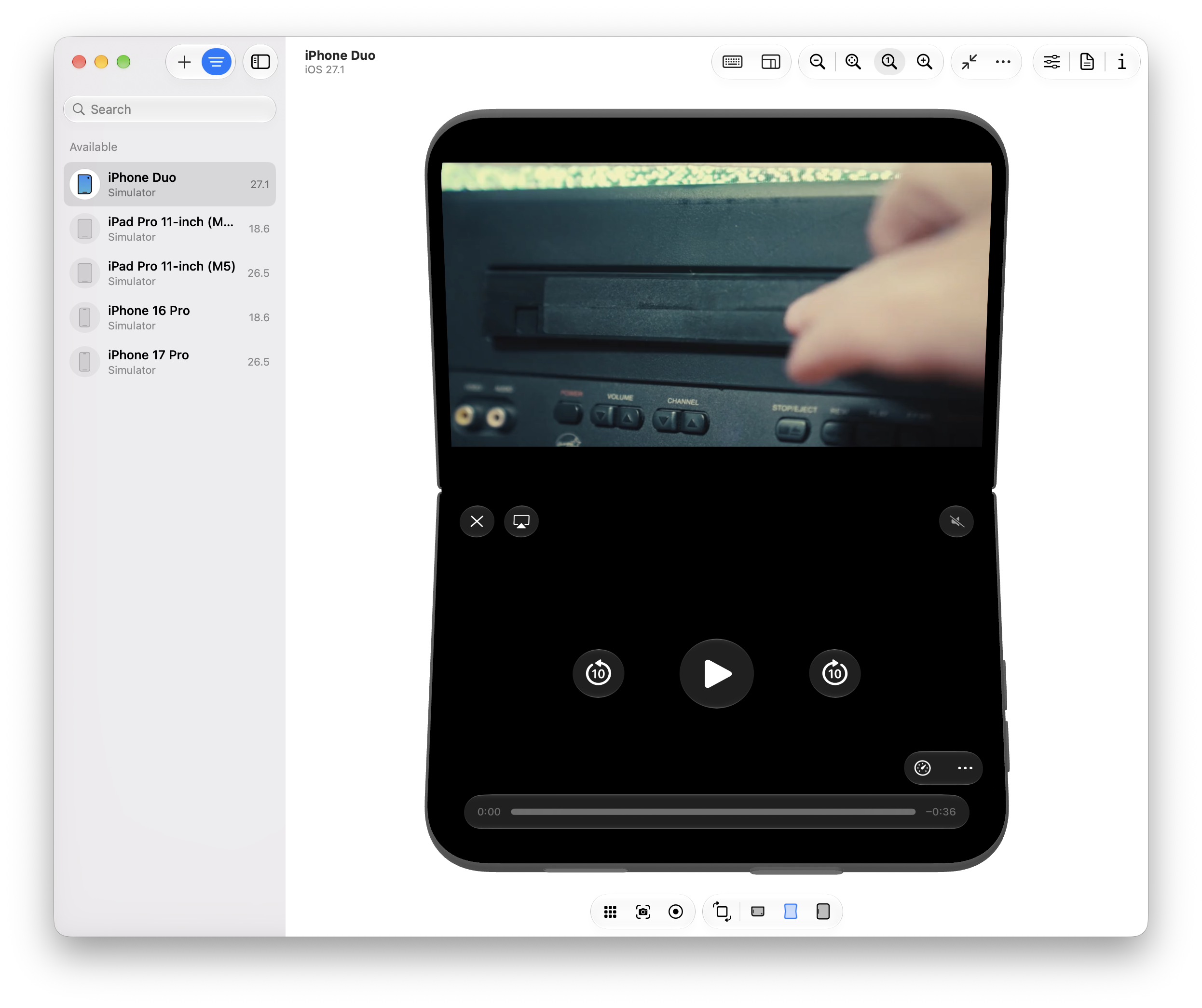 Fullscreen video on a folded iPhone Duo using Safari’s native controls, spread across the bottom half