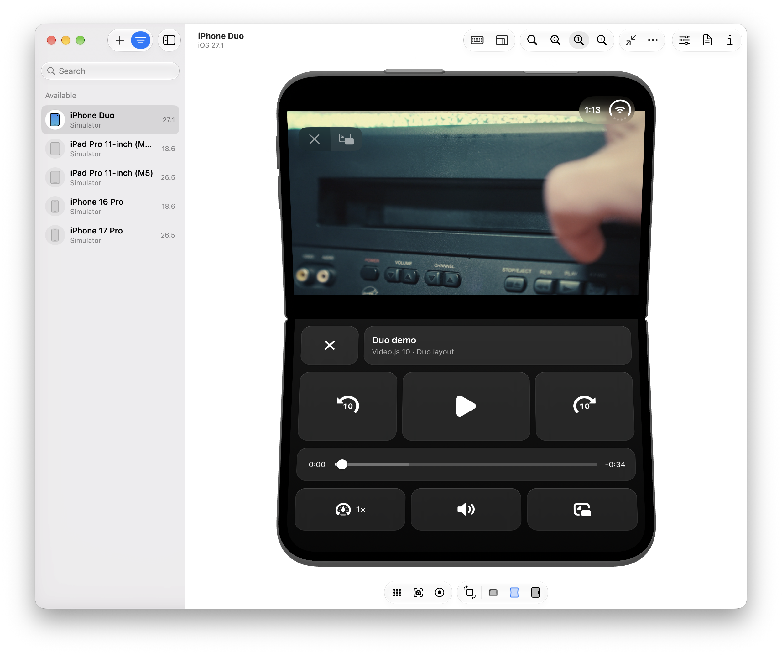 Video.js on a folded iPhone Duo with the video on the top half and Netflix-style tiled controls filling the bottom half