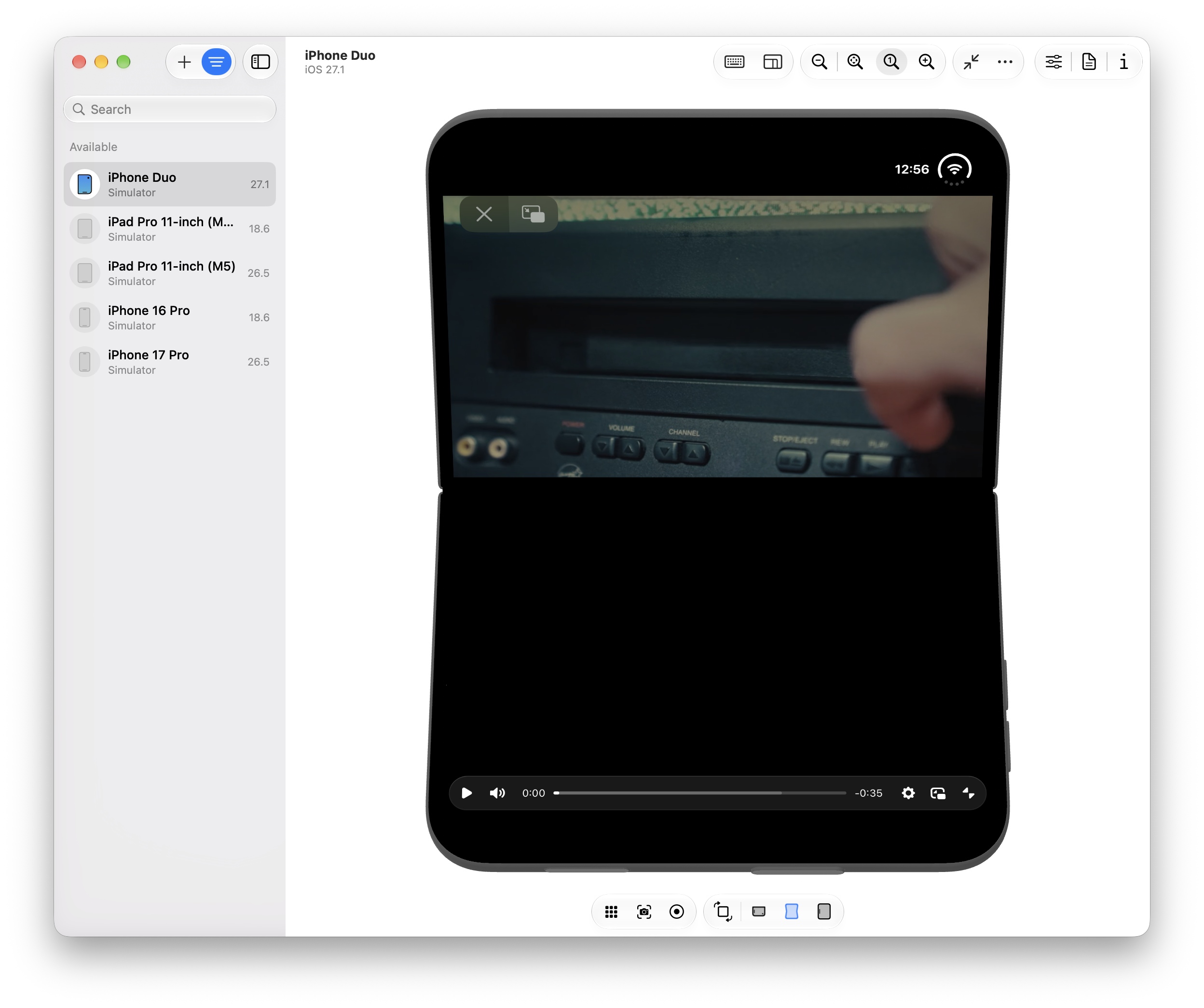 Video.js controls in fullscreen on a folded iPhone Duo, with the video on the top half and the control bar at the bottom of the screen
