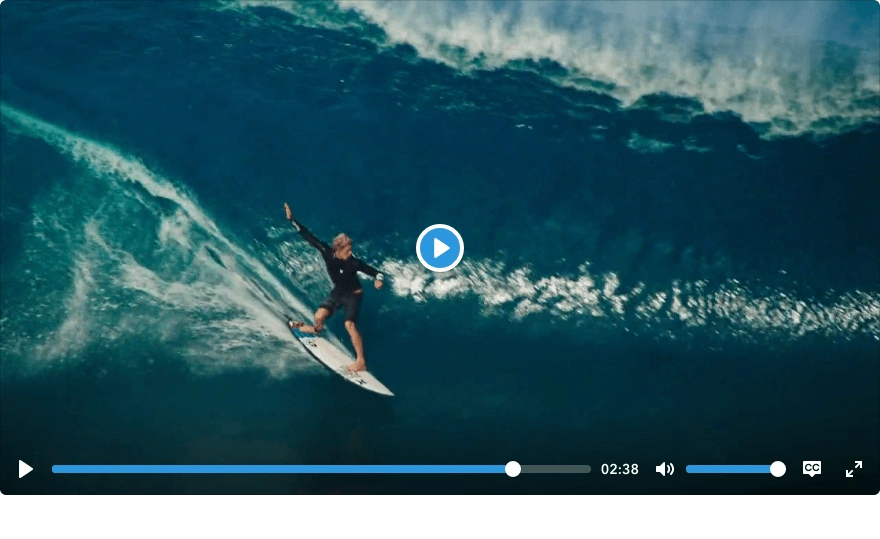 Controls over a surfer riding a wave, with a blue progress slider and a blue central play button outlined in white.
