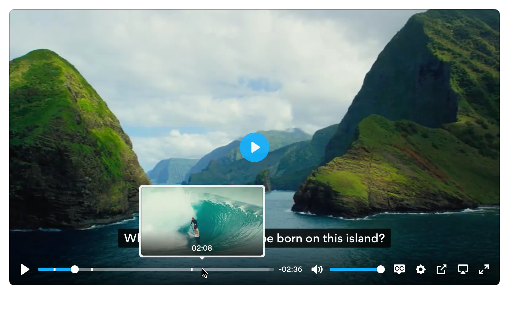 Controls over island scenery, with a blue central play button, captions, and a thumbnail preview above the seek slider.